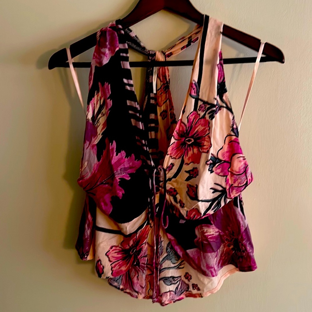 NWT Free People tank. Beautiful colors and design. Size large.